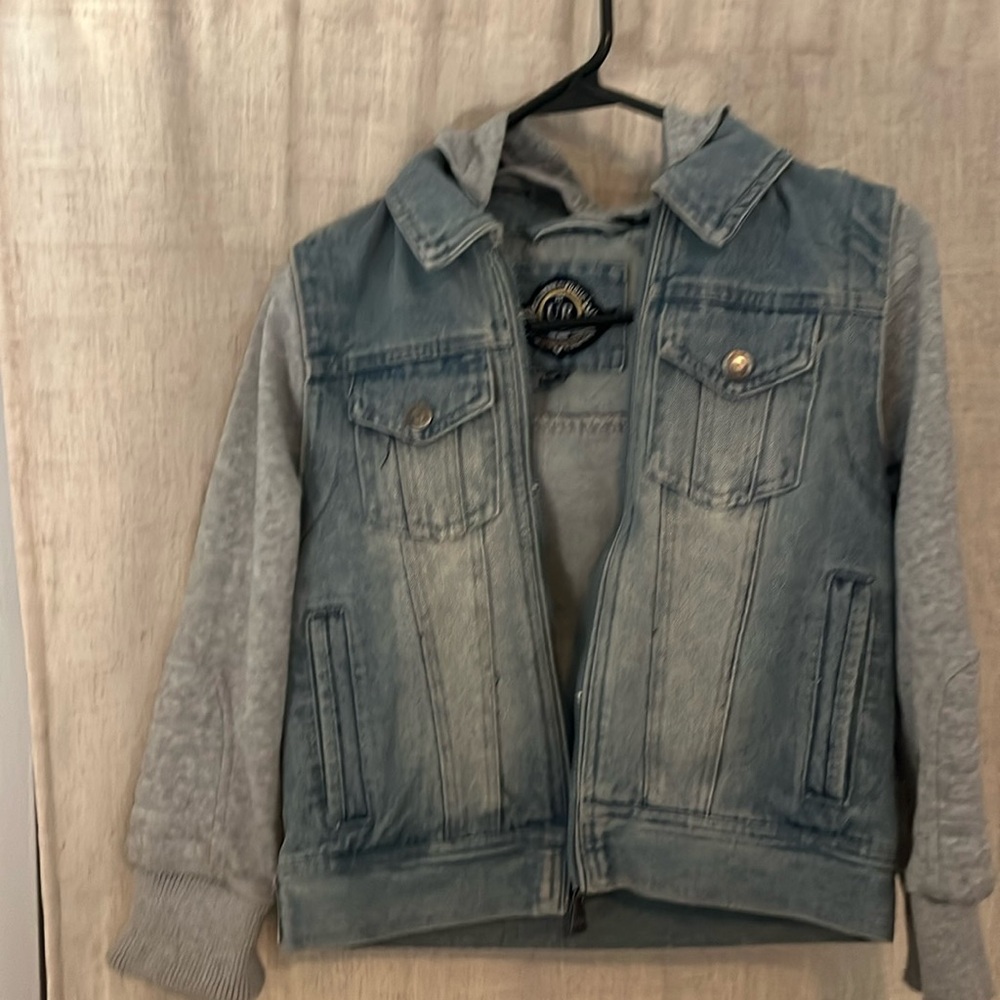 Little boy jean jacket with removable hood.